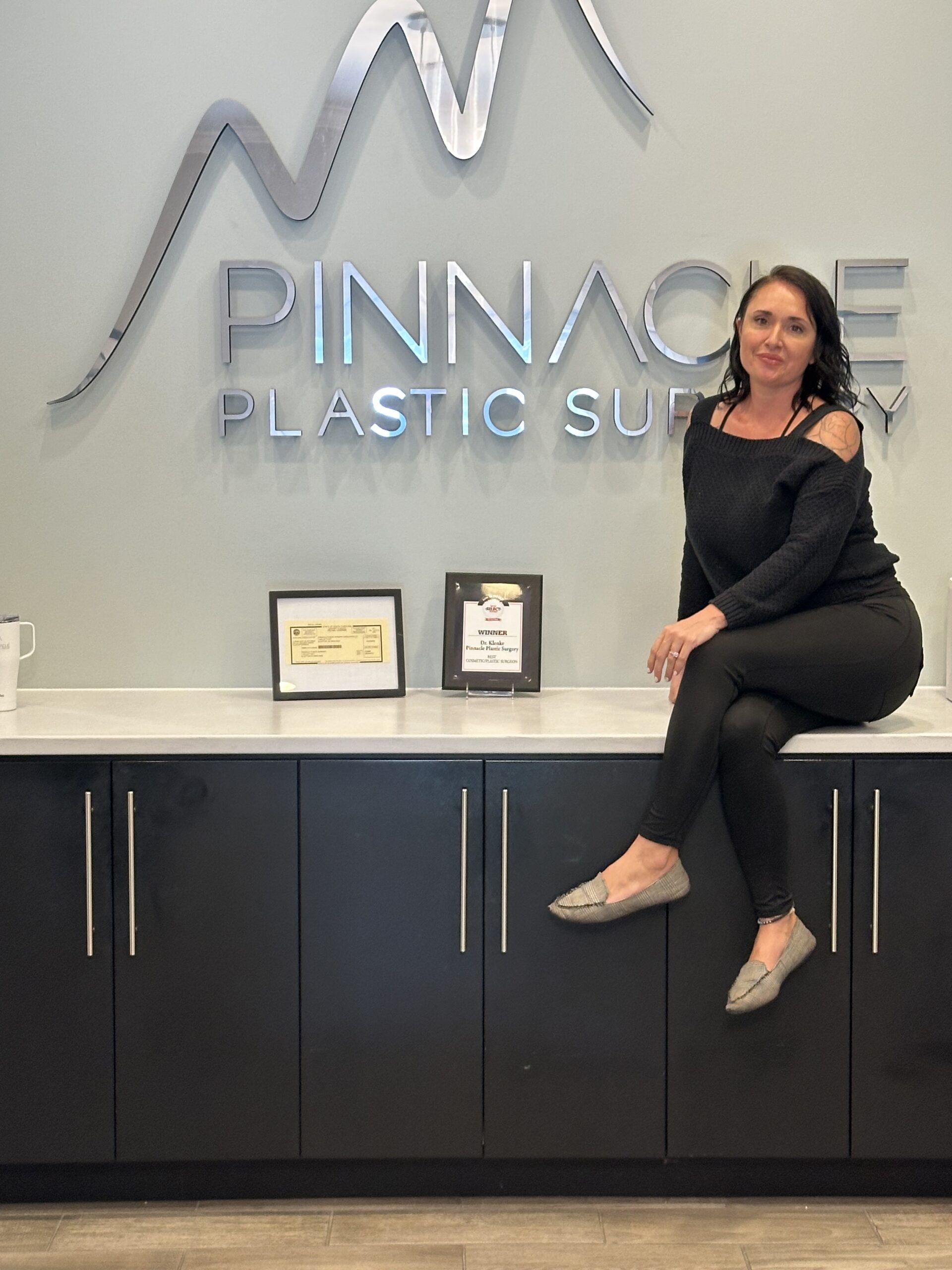 A Person Sitting In A Room